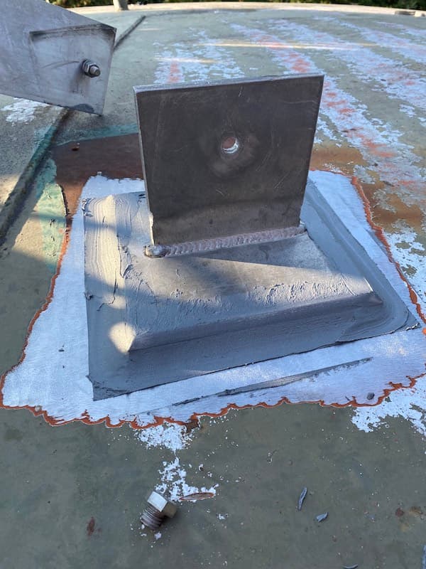 Completed 5G antenna plate bonding on potable water tank